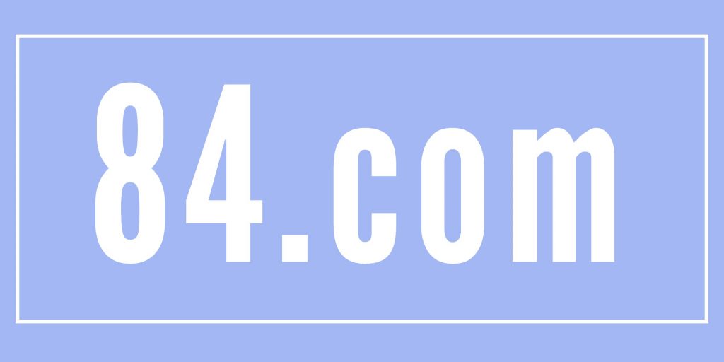84.com on a light blue background