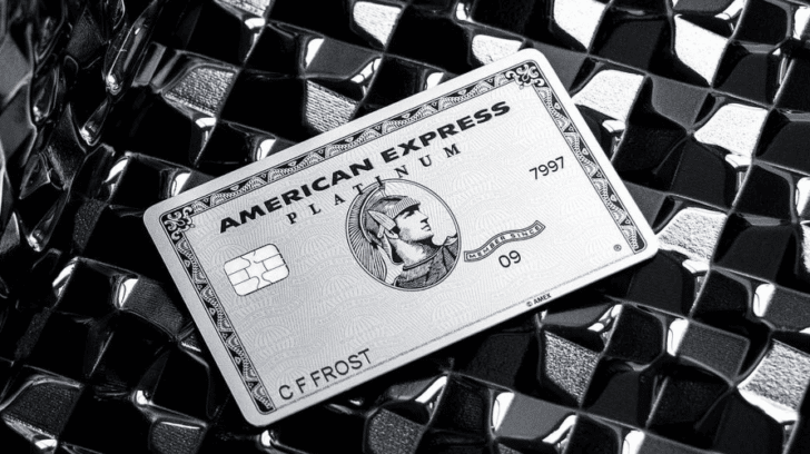 Picture of American Express Platinum card on black backgrond.