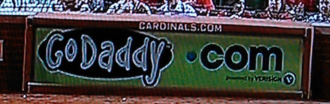 GoDaddy.com baseball ad close up