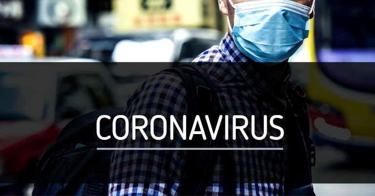Picture of man wearing surgical mask with the word "Coronavirus" overlayed