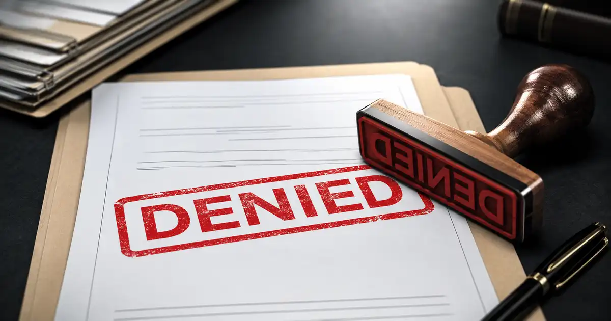 rubber stamp with denied on it
