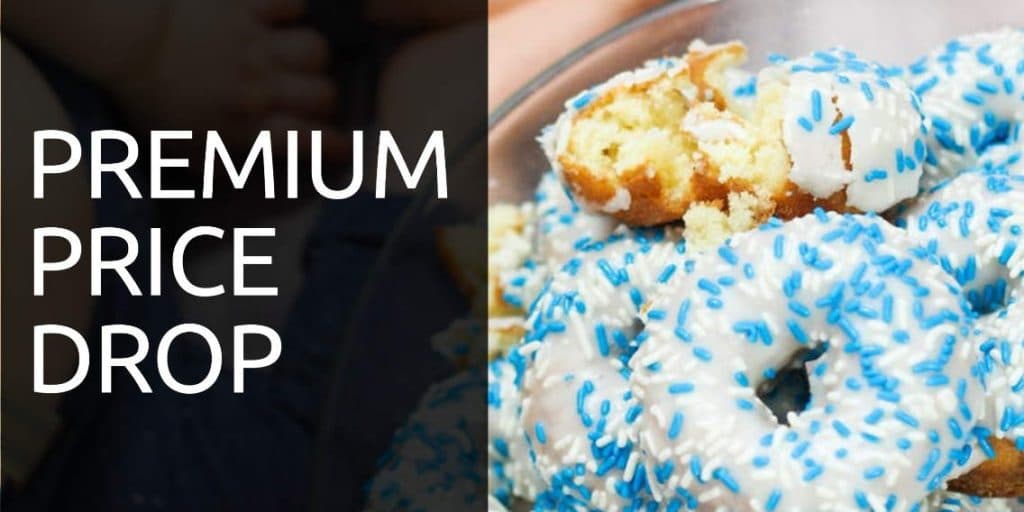 A picture of donuts with white frosting and blue sprinkles with the words "premium price drop"