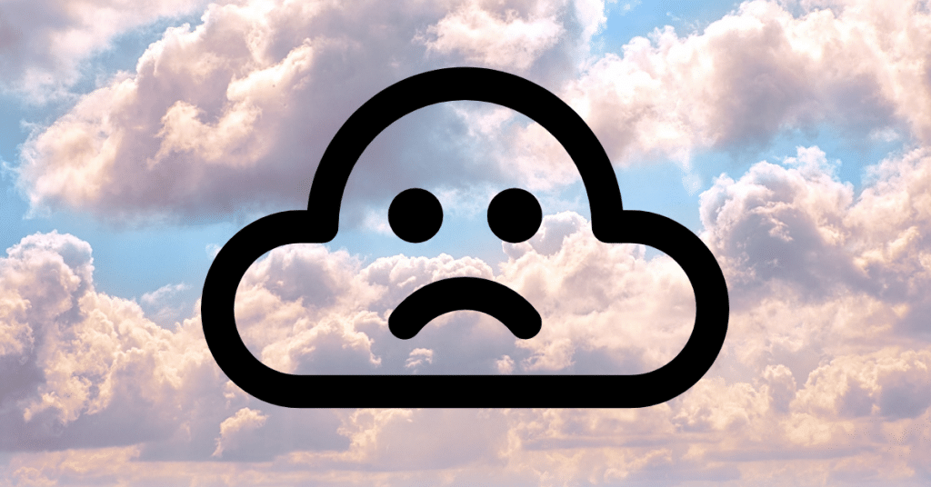 Picture of clouds with a cloud icon with a frown face