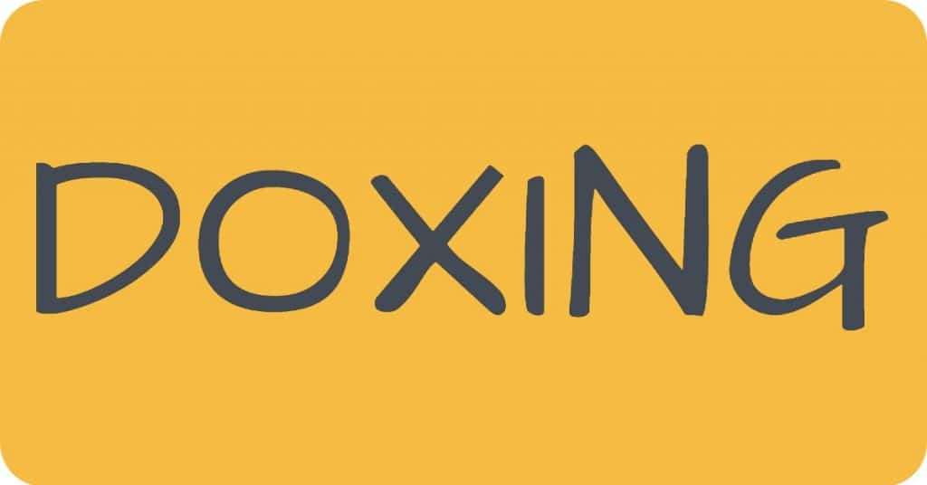 A yellow-orange background with the word 'doxing' on it