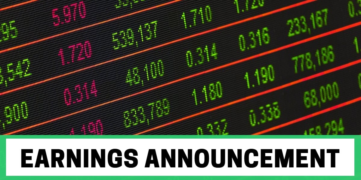 Picture of a stock ticker board with words "earnings announcement" below it
