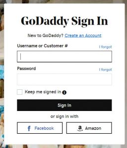 The GoDaddy single sign-on screen. It allows users to sign on using a Facebook or Amazon account