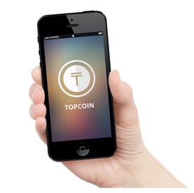 Picture of phone with Topcoin cryptocurrency logo